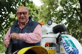 Councillor Andrew Parasksos pictured with the new waste vacuum cleaner before its deployment on the streets of Harrogate