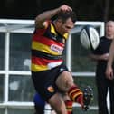Harrogate RUFC fly-half Sam Fox kicks for goal. Picture: Gerard Binks