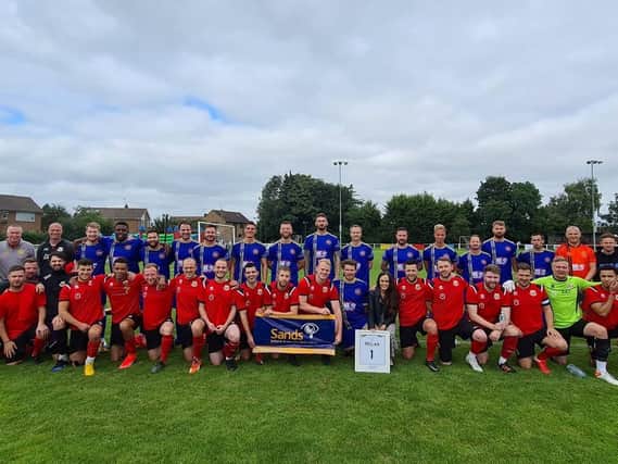 Teams from Harrogate Railway and Knaresborough Town AFC line up with Simon and Zoe Parkes at the charity football match