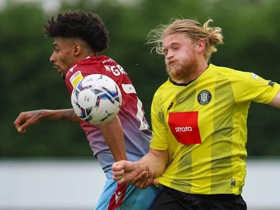 Luke Armstrong won plenty in the air during Harrogate Town's League Two success over Scunthorpe United. Pictures: Matt Kirkham
