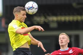 Jack Muldoon heads Harrogate Town into an eighth-minute lead against Scunthorpe United. Pictures: Matt Kirkham