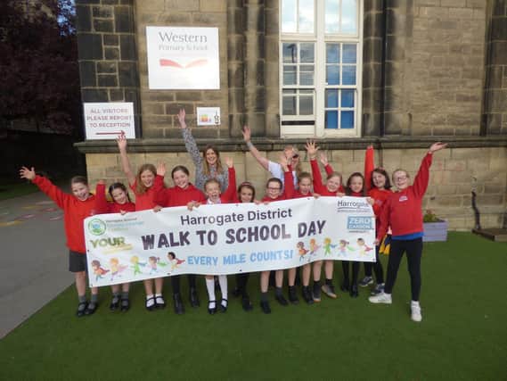 Western Primary School pupils and teachers celebrate the success of the second Harrogate Walk to School Day - more than 10,000 children across the district took part.