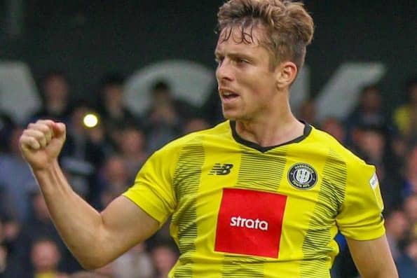 Danilo Orsi celebrates after scoring from the penalty spot during Harrogate Town's 6-1 success over Scunthorpe United. Pictures: Matt Kirkham