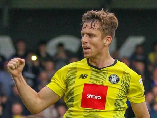 Danilo Orsi celebrates after scoring from the penalty spot during Harrogate Town's 6-1 success over Scunthorpe United. Pictures: Matt Kirkham