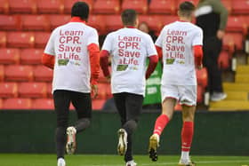 Players from Harrogate Town are among those who star in a video which provides simple instructions about how to perform hands-only CPR