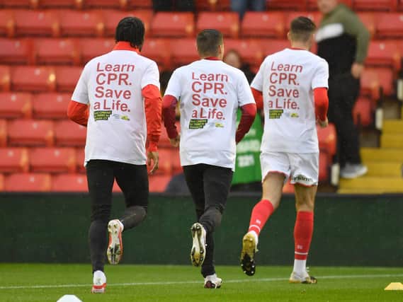 Players from Harrogate Town are among those who star in a video which provides simple instructions about how to perform hands-only CPR