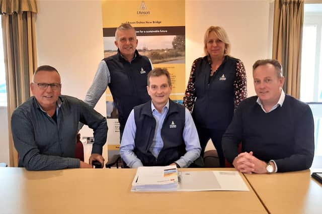 I'Anson Brothers Ltd, the Masham-based animal feed manufacturer, has signed contracts enabling work to begin on the construction of the company's new, £20m mill at Dalton New Bridge. Pictured (l to r): Rob Hinton, of Dutch mill engineering firm Ottevanger, directors Will and Chris I'Anson, managing director Sarah Richardson, and Erik Ottevanger.