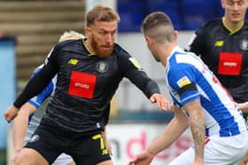 George Thomson in action during Harrogate Town's defeat at Hartlepool United. Pictures: Matt Kirkham