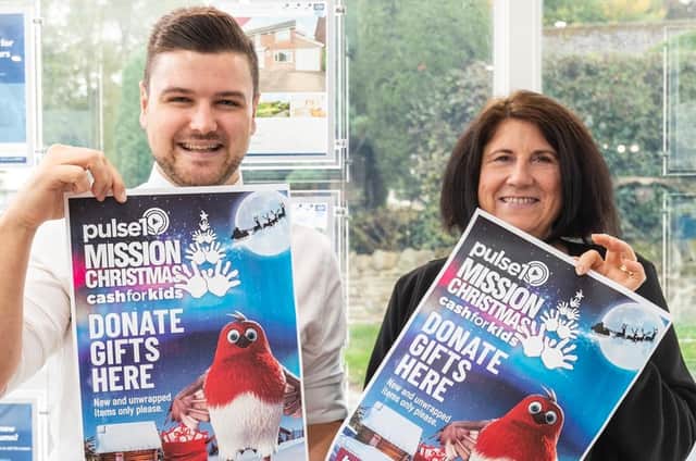Alex Ryan and Jenni Howell from Dacre, Son & Hartley are on a mission to collect presents for local children this Christmas