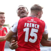 Wrexham defender Tyler French celebrates with team-mate Dior Angus. Pictures: Getty Images
