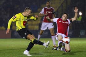 Alex Pattison takes aim at the Wrexham goal during Harrogate Town's 2-1 FA Cup win at Wetherby Road. Pictures: Matt Kirkham
