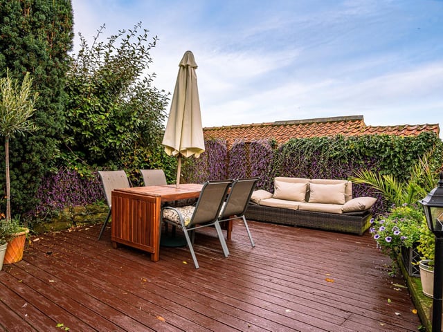 An al fresco dining and entertaining area within the garden.