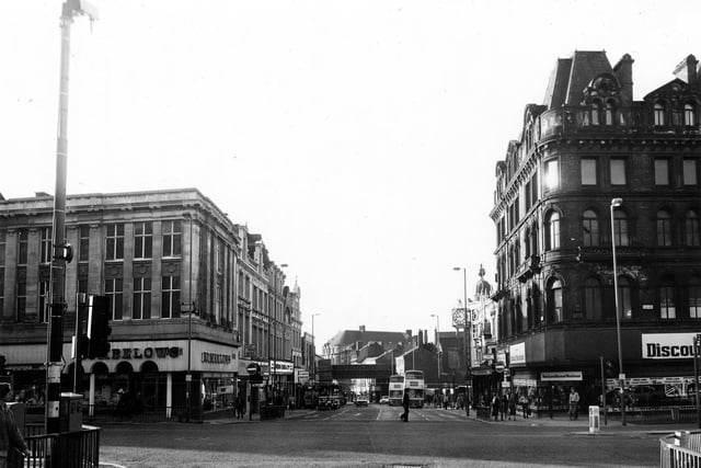 Looking south along Briggate from the junction with Duncan Street and Boar Lane in September 1981. On the left is Rumbelows TV & Electrical Goods; on the right, Boar Lane Discount Warehouse, and further along, John Dyson, jewellers, from which a clock is seen protruding out.