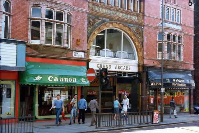 The east side of New Briggate, with the entrance to the Grand Arcade in the centre, pictured in July 1985.
