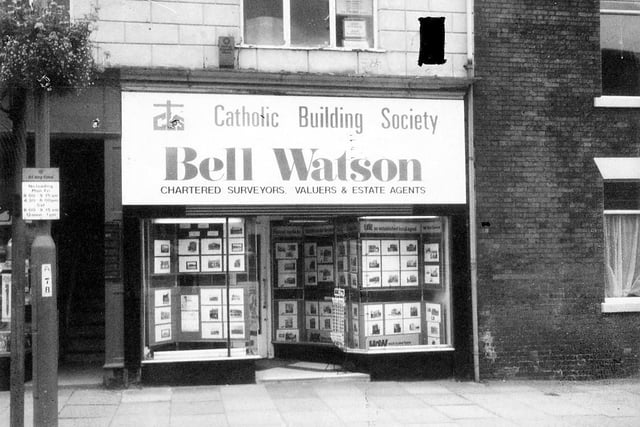 September 1980 and pictured on The Headrow, are the premises of Bell Watson, estate agents, charted surveyors and Catholic Building Society.