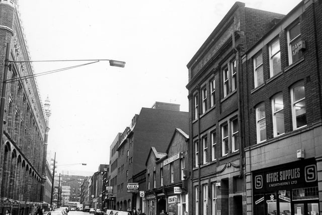 St. Paul's Street towards the junction with East Parade and King Street in November 1982. On the left is St. Paul's House, the clothing warehouse built for John Barran by Thomas Ambler in 1878. First on the right is Office Supplies (Northern) Ltd., then Silvio's Bakery.