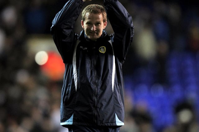 Leeds United Simon Grayson applauds the travelling fans at full-time.