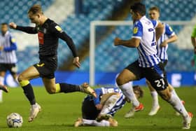 Harrogate Town winger Jack Diamond leaves Sheffield Wednesday defenders trailing in his wake at Hillsborough. Pictures: Matt Kirkham