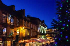 Knaresborough Christmas Market at night with Christmas twinkly lights by local photographer Charlotte Gale