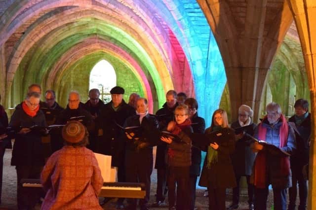 Harrogate Theatre Choir pictured performing at Fountains Abbey.