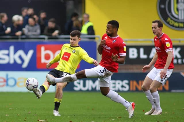 Simon Power in action against Salford City.