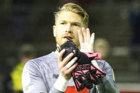 Harrogate Town goalkeeper Mark Oxley leaves the field at Carlisle United having kept a first clean-sheet in almost two months. Pictures: Matt Kirkham