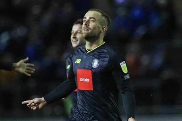 Alex Pattison celebrates after firing Harrogate Town into a two-goal lead at Carlisle United. Picture: Matt Kirkham