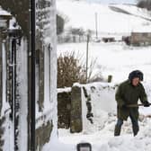 Villagers dig their way out. Picture Gerard Binks