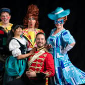 The cast of Harrogate Theatre's Cinderella whose performance was rapturously received on Friday night before the storm hit. Now the show is back on.