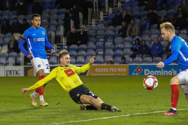 Jack Diamond stretches to score Harrogate Town's stoppage-time winner against Portsmouth. Pictures: Matt Kirkham