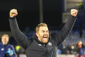 Simon Weaver celebrates Harrogate Town's FA Cup second round victory at Portsmouth FC with the club's travelling support. Pictures: Matt Kirkham