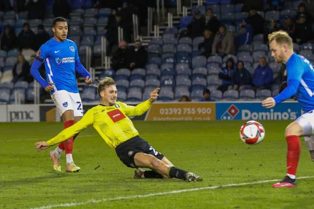 Jack Diamond stretches to score Harrogate Town's dramatic late winner during Saturday's 2-1 success at Portsmouth. Picture: Matt Kirkham