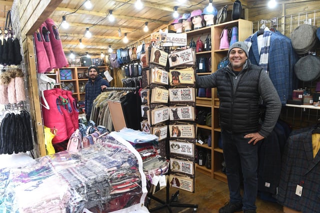 Malky Singh and Stan Cosmin on their clothes stall