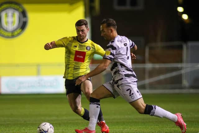 Forest Green Rovers' Kane Wilson caused Nathan Sheron and the rest of his Harrogate Town team-mates all sorts of problems during Tuesday night's League Two clash at Wetherby Road. Pictures: Matt Kirkham