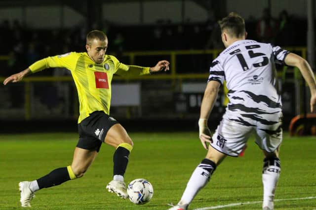 Alex Pattison in action against Forest Green Rovers on Tuesday evening. The Harrogate Town midfielder and his team-mates have been told not to dwell on that defeat ahead of Saturday's clash with Northampton. Pictures: Matt Kirkham