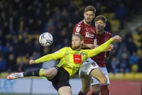 Harrogate Town striker Luke Armstrong takes aim at the Northampton Town goal. Pictures: Matt Kirkham