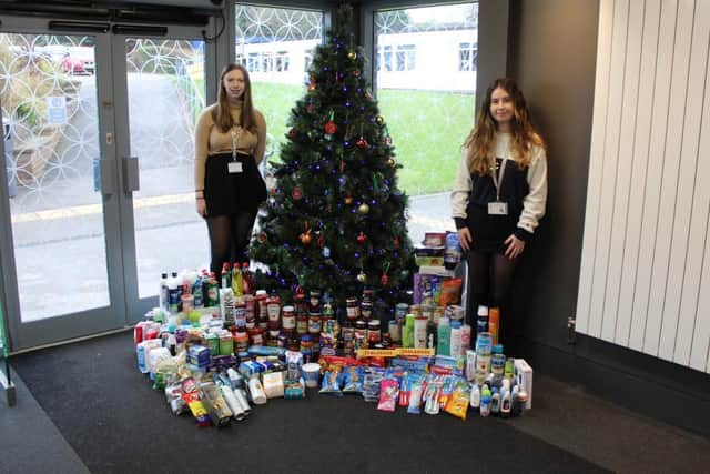 Trinny Sadler and Emma Duffy with Rossett School’s foodbank donations