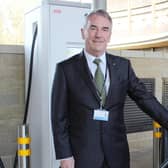 Coun Phil Ireland, Harrogate Borough Councils cabinet member for sustainable transport, uses one of the rapid electric car chargers available for public use at the council's civic centre.