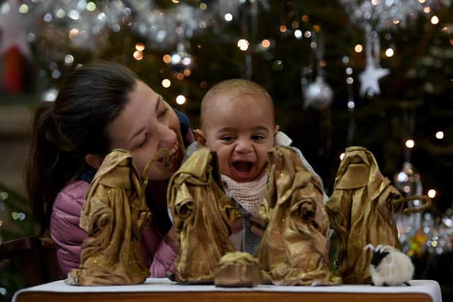 Mum Katie Marshall and her six year old son Arlo enjoying one of the nativity scenes