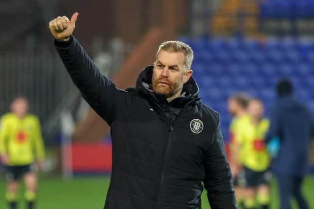 Harrogate Town manager Simon Weaver salutes the club's travelling support following Tuesday night's 2-1 EFL Trophy win at Tranmere Rovers. Pictures: Matt Kirkham
