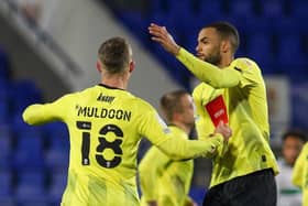 Jack Muldoon is congratulated by team-mate Warren Burrell after drawing Harrogate Town level in the 54th minute of Tuesday's EFL Trophy clash with Tranmere Rovers. Pictures: Matt Kirkham