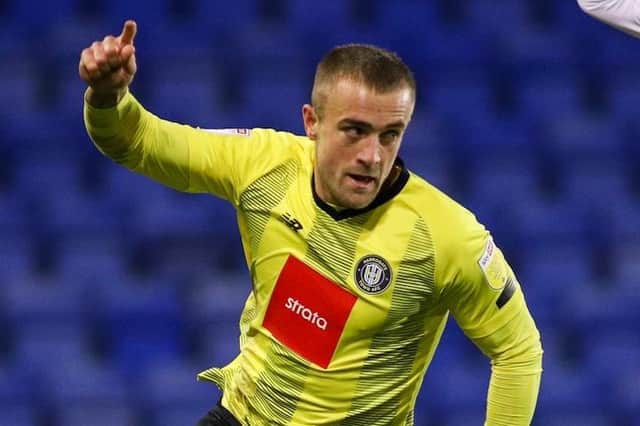 Alex Pattison celebrates after netting Harrogate Town's second goal against Tranmere Rovers. Pictures: Matt Kirkham