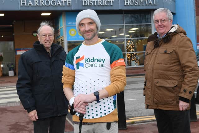 Dr Albert Day (left) and John Fox (right) of the Friends of Harrogate Hospital with Mark Smith who has just completed a 850 mile walk raising awareness and money for Kidney Care UK and the Friends of Harrogate Hospital