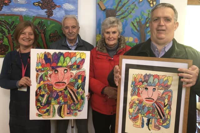Andrew with his Pearly King artwork with his parents and Shirley Hudson, Artist and Art Studio workshop Leader.