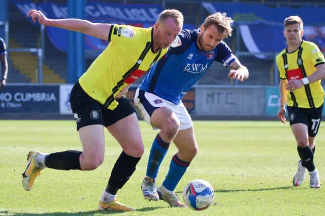 Mark Beck in action against Carlisle United in April 2021.