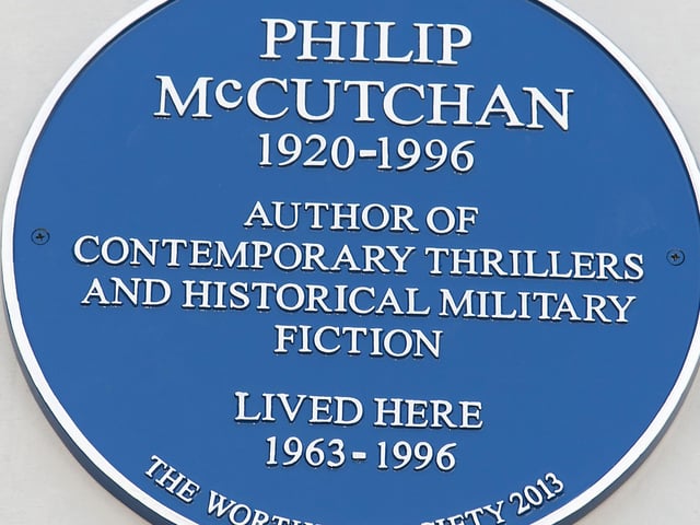 The blue plaque at the house in Portland Road, Worthing, where Philip McCutchan lived from 1963 to 1996.
