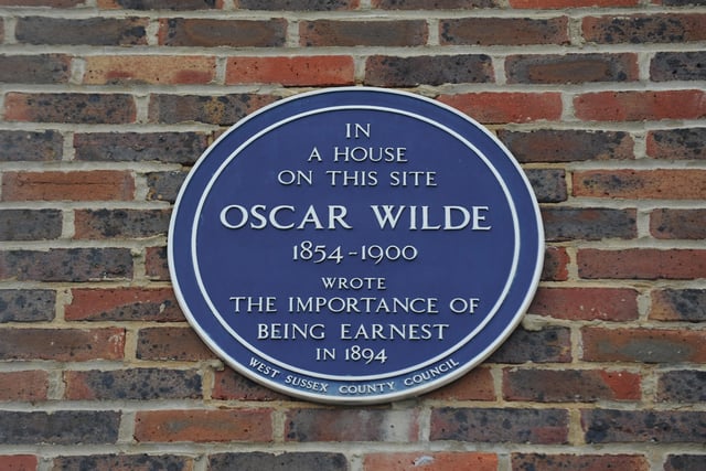 The blue plaque for Oscar Wilde on the site of Esplanade House, The Esplanade, Worthing, where he stayed.