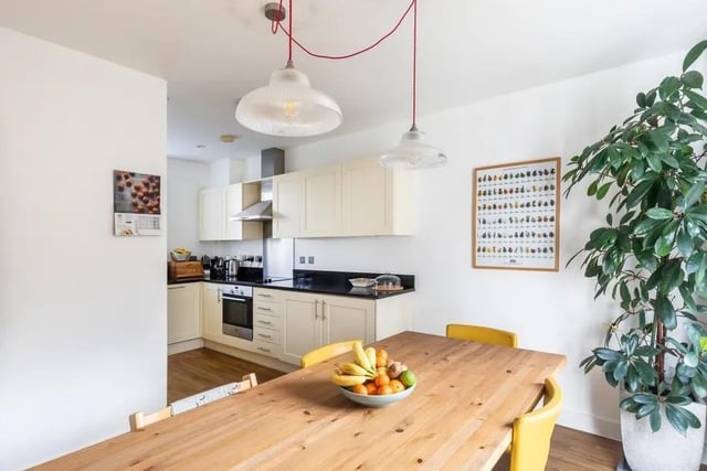 The kitchen diner provides plenty of granite work surface space and includes integrated appliances like a fridge/freezer, dishwasher, washer/dryer, oven and ceramic hob. Picture: Move Revolution.