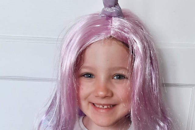 Lilah-Rose aged 5 dressed as a unicorn at Discovery Primary. Her favourite book is Sugarlump and the Unicorn.