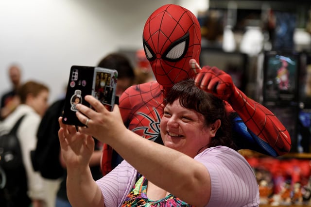 Spider-Man poses for selfies with visitors at Comic Con Yorkshire